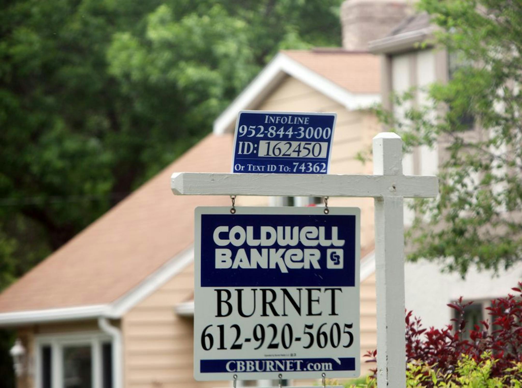 Reluctant buyers and a glut of foreclosed homes for sale keep driving prices down.