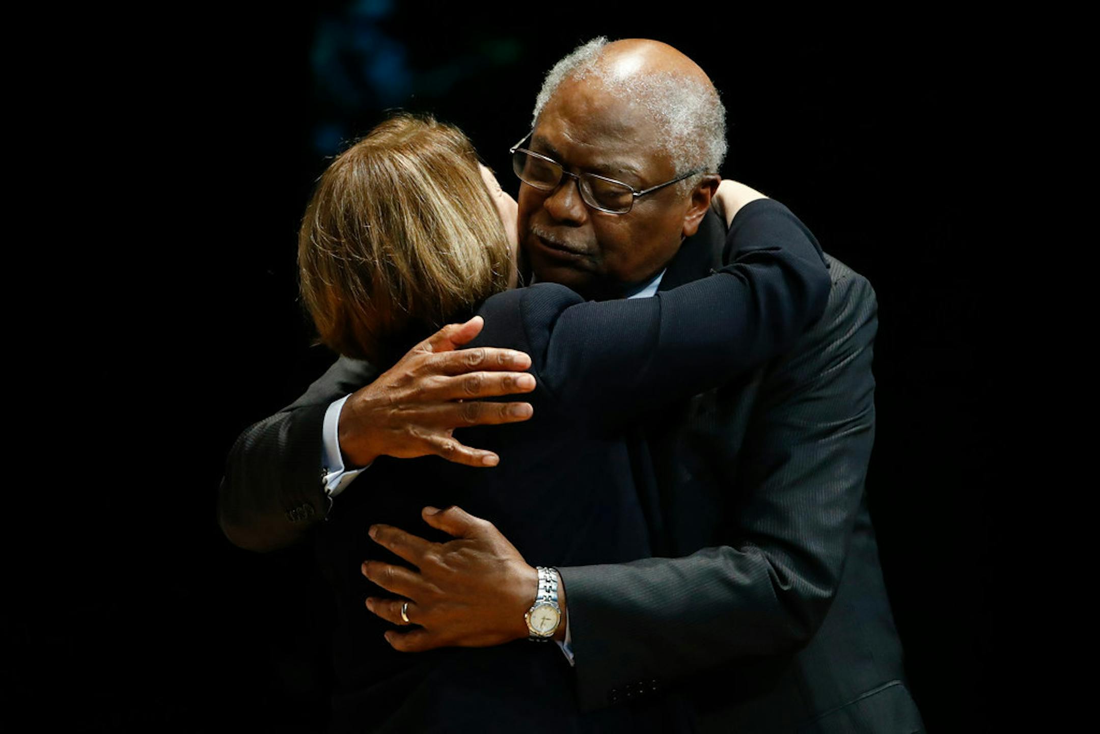 Rep. James Clyburn, D-S.C., embraces Democratic presidential candidate Sen. Amy Klobuchar, D-Minn before she speak at the National Action Network South Carolina Ministers' Breakfast, Wednesday, Feb. 26, 2020, in North Charleston, S.C.