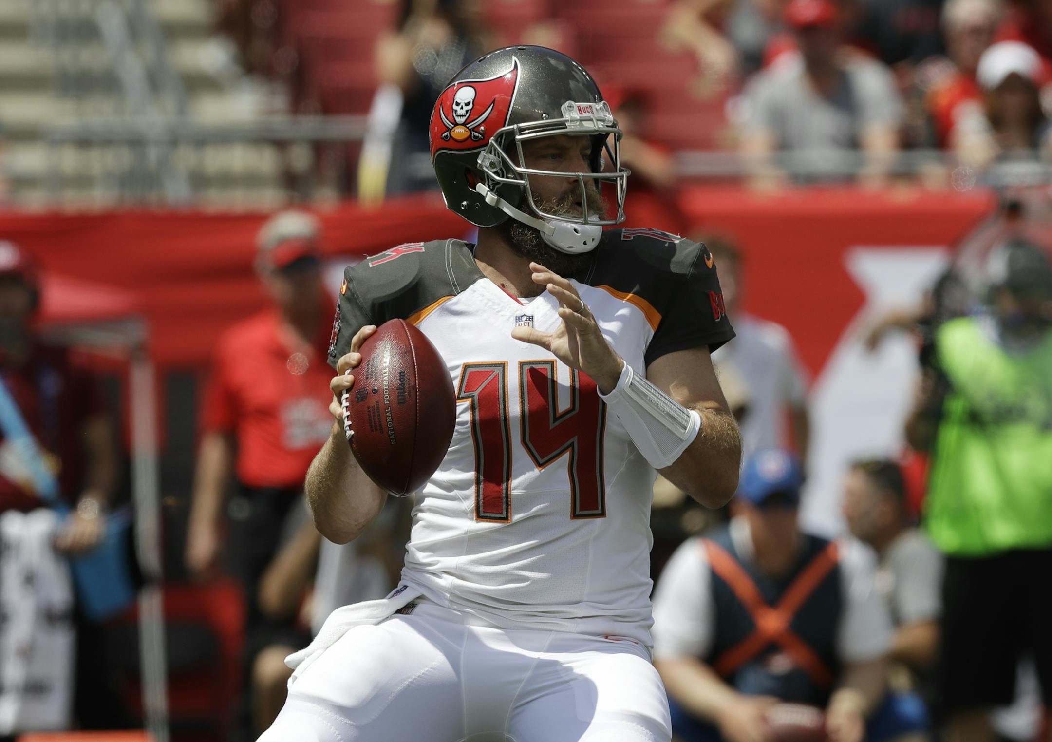 Tampa Bay Buccaneers quarterback Ryan Fitzpatrick (14) looks to pass,during the first half of an NFL football against the Philadelphia Eagles, Sunday, Sept. 16, 2018, in Tampa, Fla. (AP Photo/Chris O'Meara)