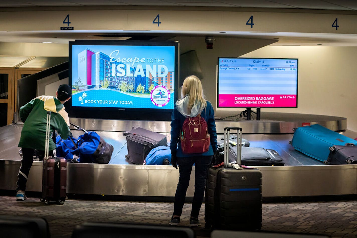 The baggage claim at the Minneapolis-St. Paul International Airport is in the midst of a multi-million dollar overhaul. Passengers collect their bags from small and dimly lit baggage carousels which will be replaced by a brighter larger baccage area. ] GLEN STUBBE • glen.stubbe@startribune.com Monday, March 9, 2020