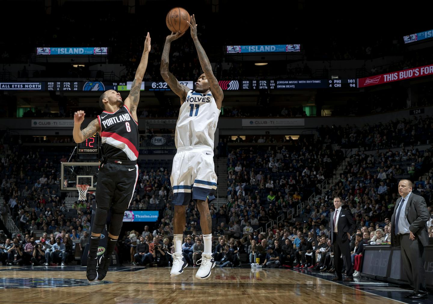 Jamal Crawford (11) shot and scored over Al-Farouq Aminu (8) in the fourth quarter. ] CARLOS GONZALEZ &#xef; cgonzalez@startribune.com - December 18, 2017, Minneapolis, MN, Target Center, NBA, Basketball, Minnesota Timberwolves vs. Portland Trail Blazers