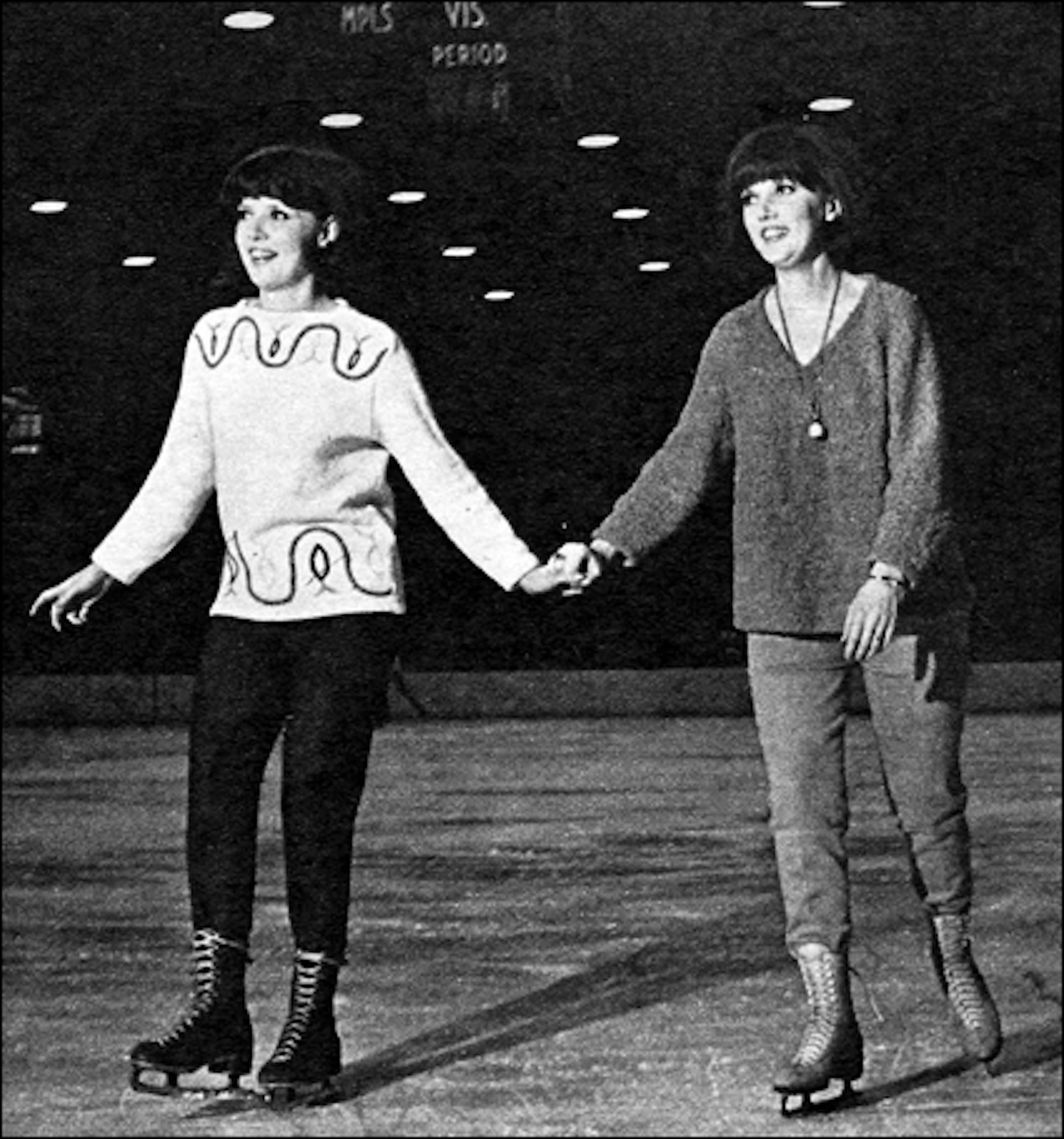 January 1966: NWA stewardesses Gloria and Gladys Thorvaldson skate at the Minneapolis Arena.