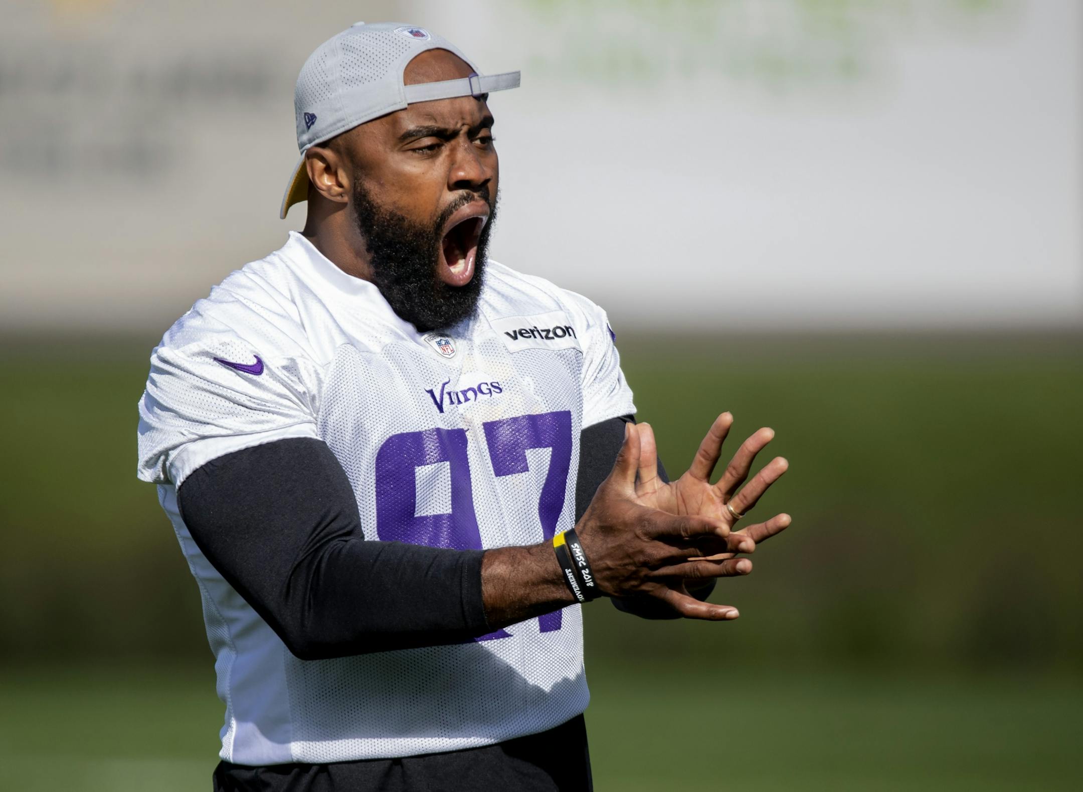 Minnesota Vikings Everson Griffen let out a yawn during the morning walk through practice.