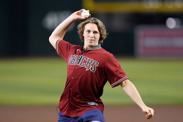 Former Gophers star Logan Cooley threw out the first pitch before the Arizona Diamondbacks game on July 6 in Phoenix.