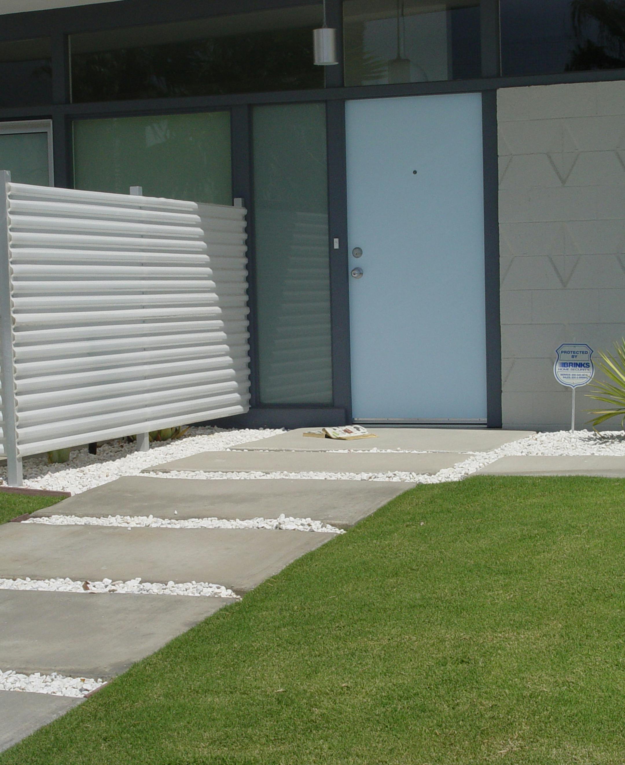 This entry requires grandma to walk up an incline while stepping over gaps filled with large gravel. (Maureen Glimer/TNS) ORG XMIT: 1202914