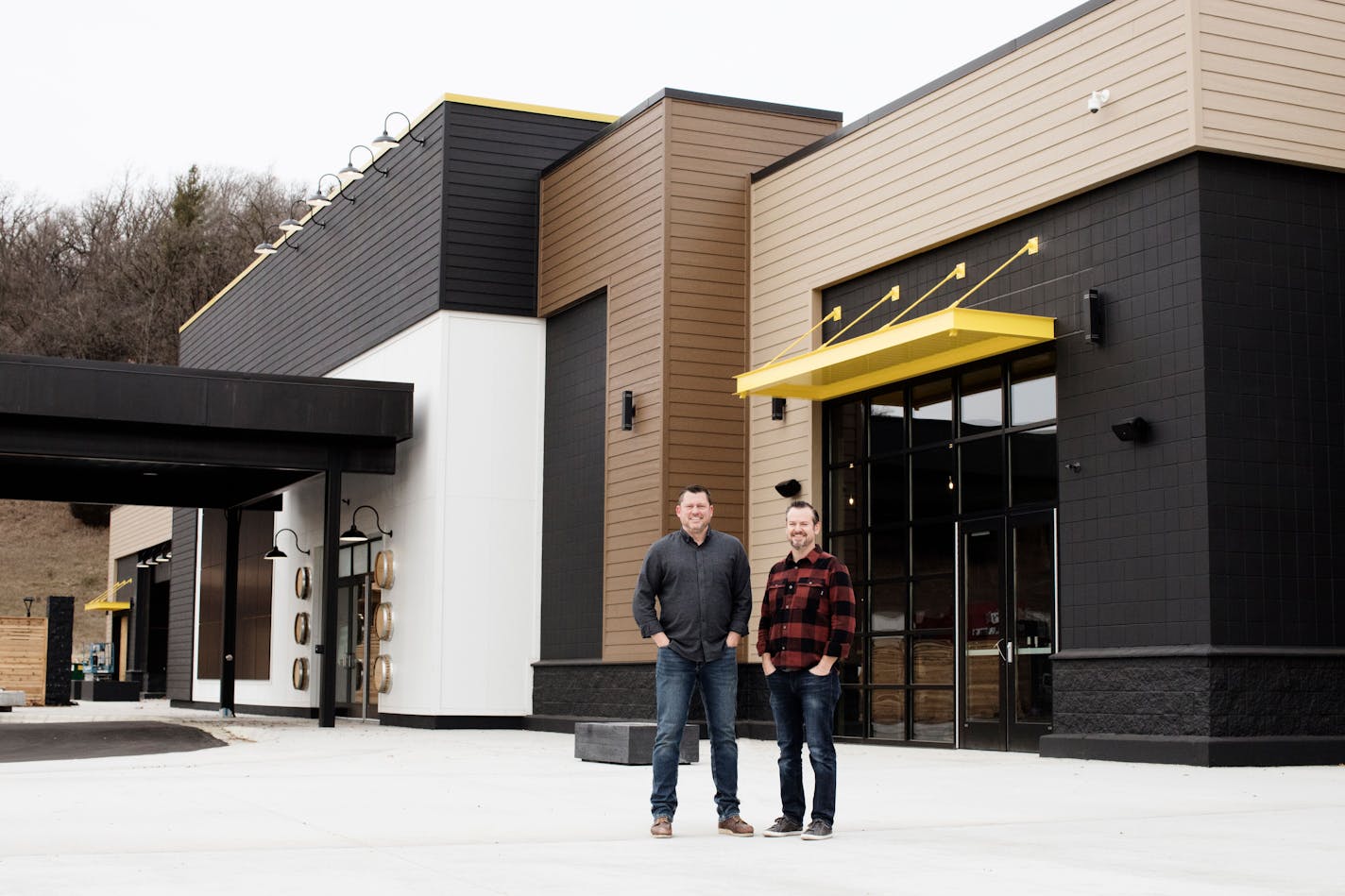 Co-founders Jon Kreidler and Dan Oskey outside the new Tattersall 'destination distillery' in River Falls, Wis.