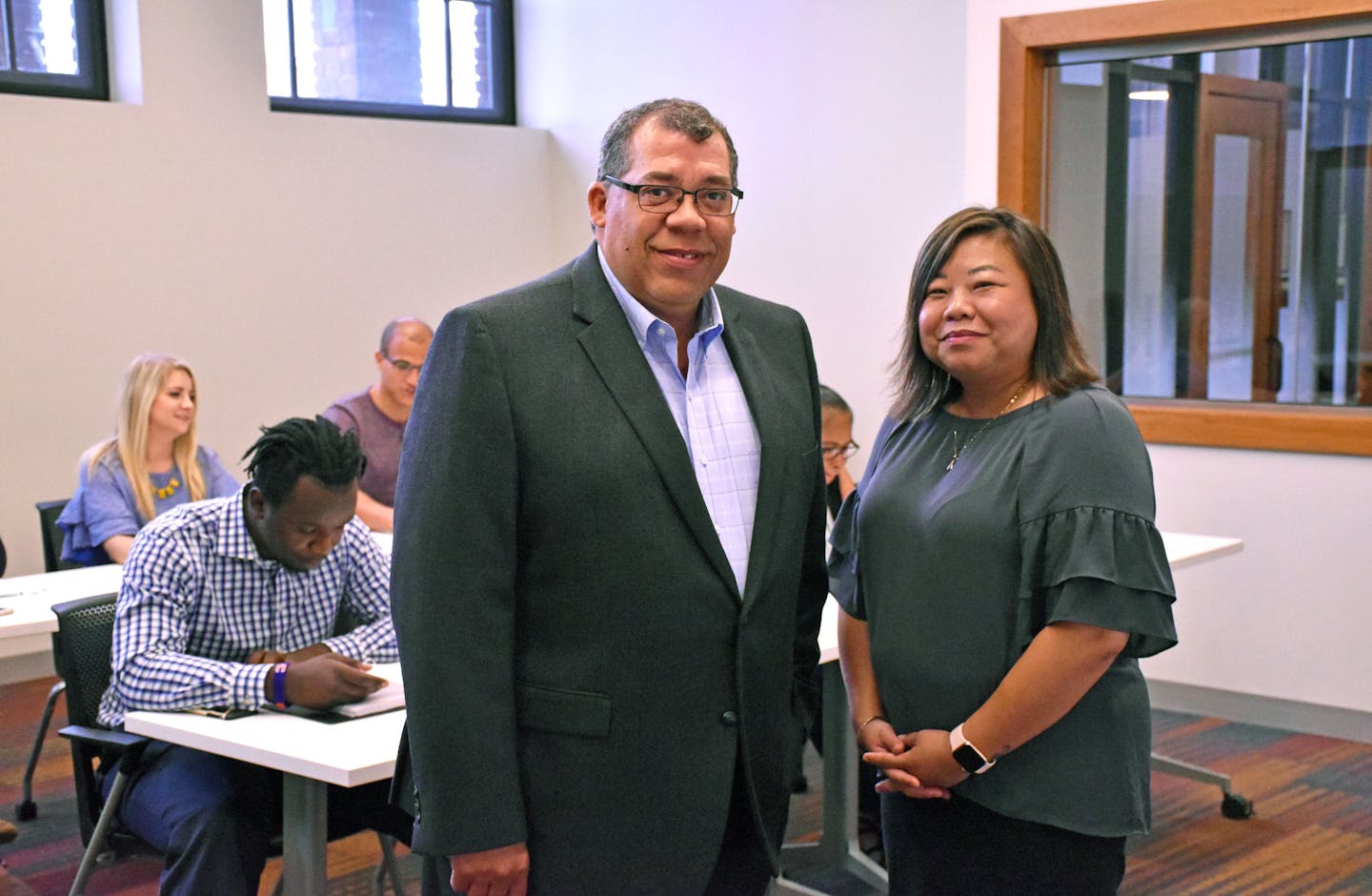 CEO Paul Williams (left) of Project for Pride in Living (PPL) and May Xiong, vice president of employment readiness, at PPL's expanded career center in the once-vacant Franklin Theater, next door to PPL's headquarters on E. Franklin and 11th Avenue S.
Photo: Laura unford/PPL