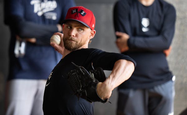 Twins pitcher Josh Staumont throws in a spring training bullpen session in February.