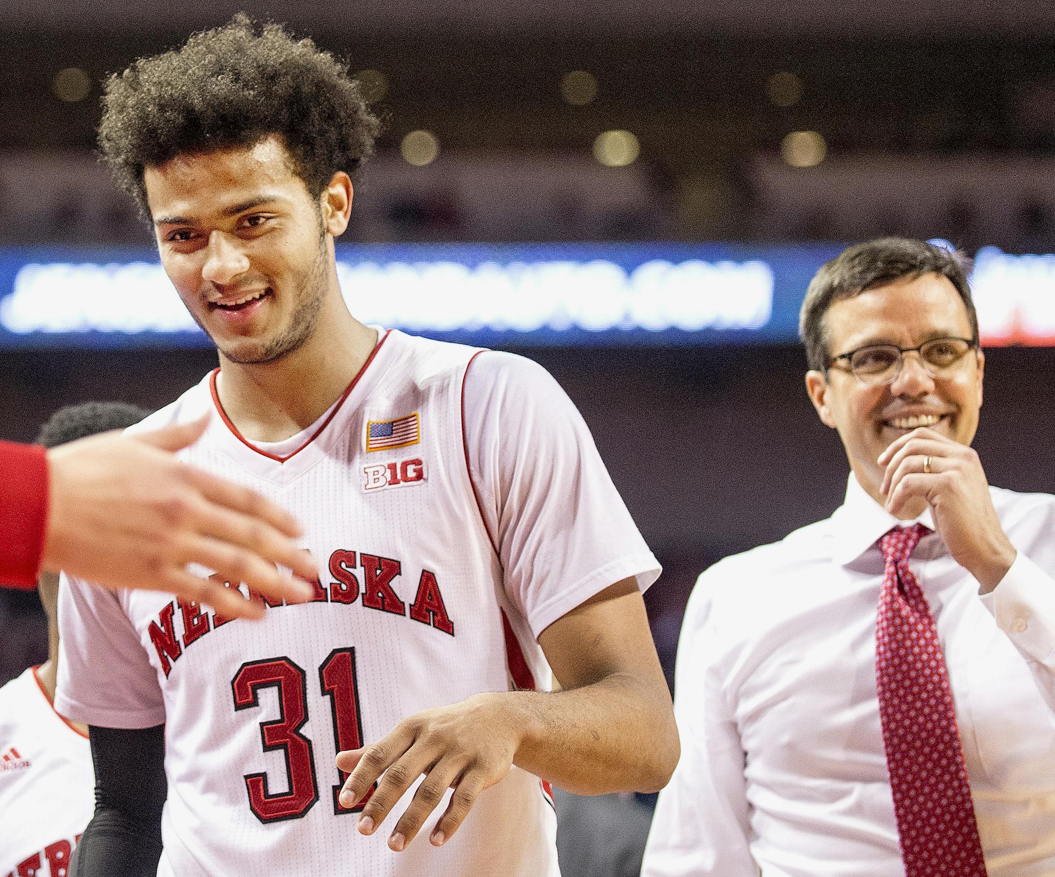 Nebraska guard Shavon Shields (31) and head coach Tim Miles smile during the second half of an NCAA college basketball game against Minnesota in Lincoln, Neb., Tuesday, Jan. 12, 2016. (Francis Gardler/The Journal-Star via AP) LOCAL TELEVISION OUT; KOLN-TV OUT; KGIN-TV OUT; KLKN-TV OUT; MANDATORY CREDIT