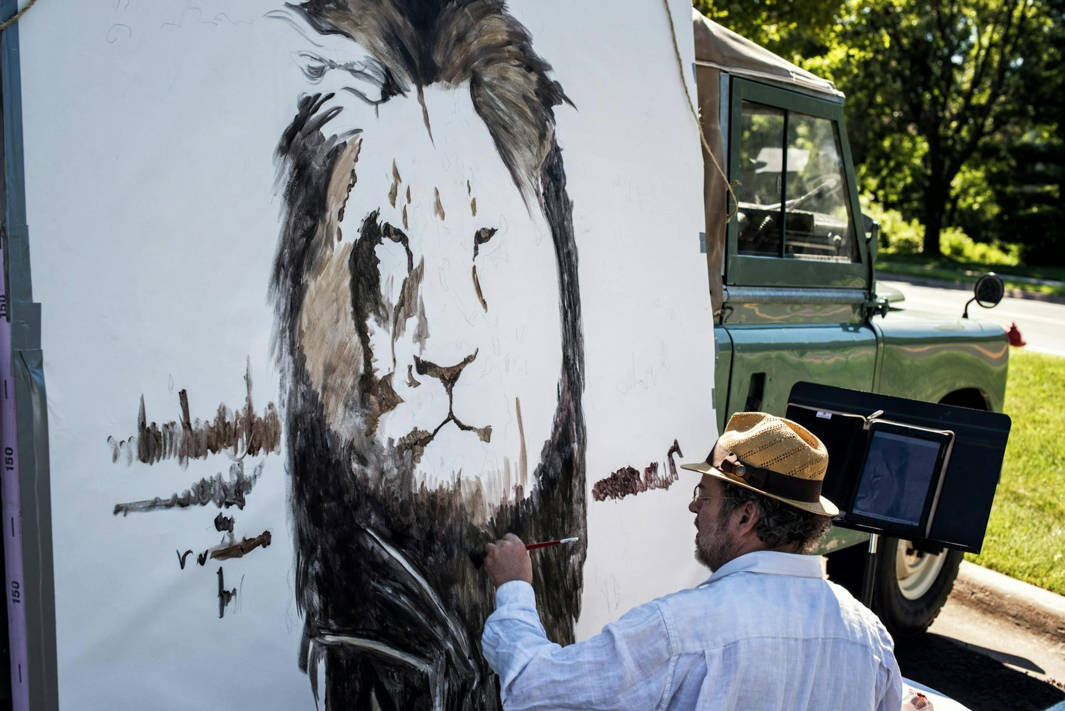 Artist Mark Balma painted a huge mural of Cecil in Dr. Walter Palmer's parking lot. Bala went to school here in the Twin Cities and was visiting friends when he decided to come down for a "silent protest" He also painted the frescoes at the University of St. Thomas Law School. He hopes to see the painting to raise money for wildlife preservation efforts.