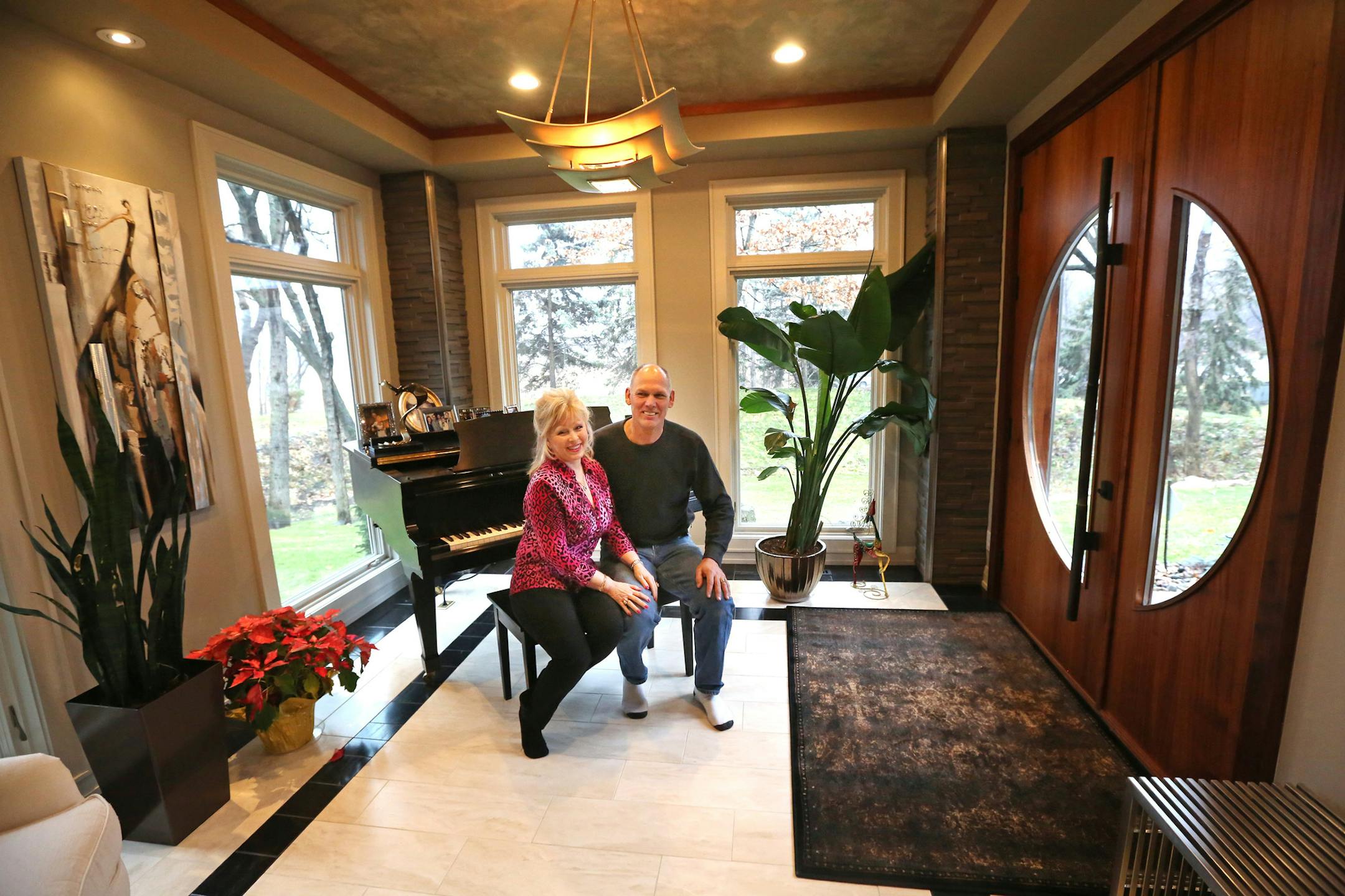 Lorri Kreuscher and her husband, Brian Koenig, in their remodeled entry.