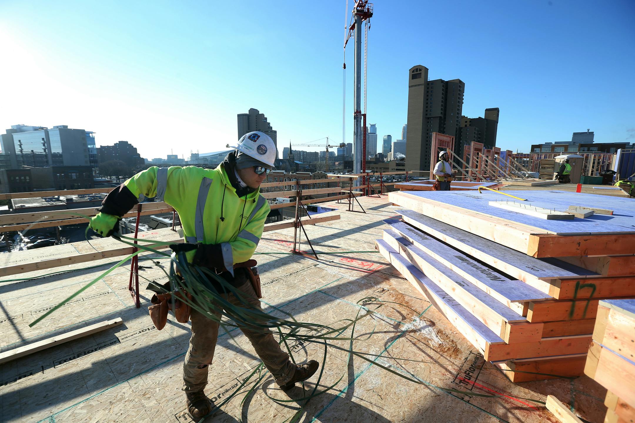 Plans for new multifamily units drove a big increase in housing permits issues in April. Nordhaus, pictured, is a 280-unit apartment building being built in northeast Minneapolis (JERRY HOLT/Star Tribune)