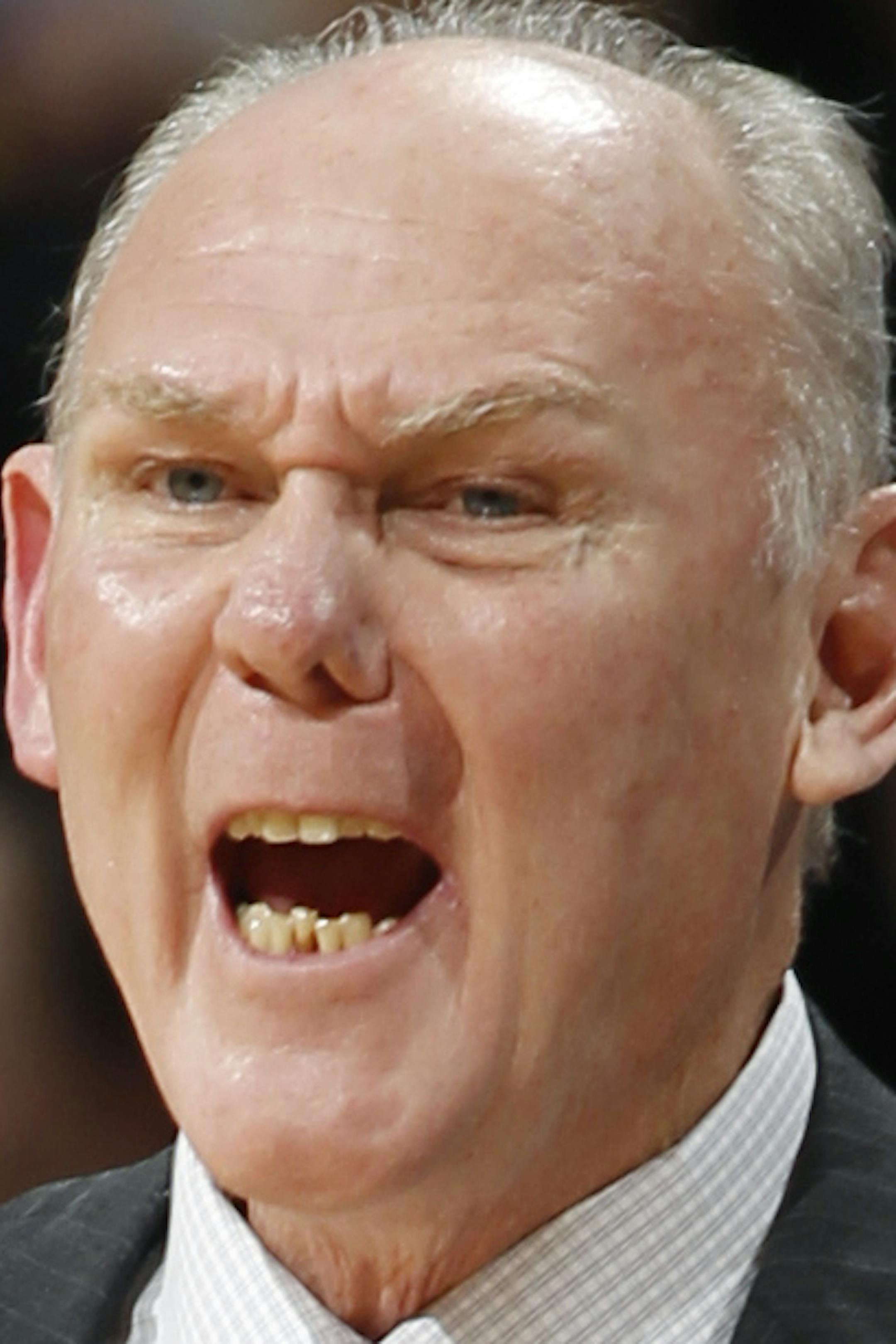 Denver Nuggets head coach George Karl directs his team against the Golden State Warriors during the first quarter of Game 5 of their first-round NBA basketball playoff series, Tuesday, April 30, 2013, in Denver. (AP Photo/David Zalubowski) ORG XMIT: CODZ108