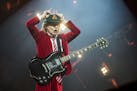 FILE - Angus Young, of AC/DC, performs at Nationwide Arena on Sept. 4, 2016, in Columbus, Ohio. After 47 years, the band is releasing its 17th studio 