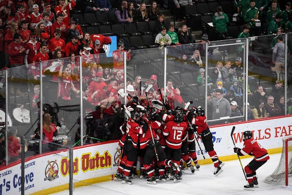 Eden Prairie players and fans celebrated their team's victory over The Blake School in Friday's 2A semifinals.