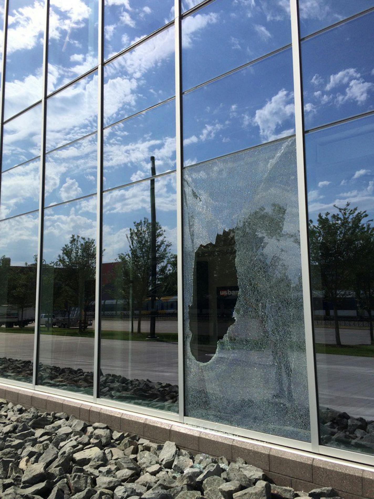 U.S. Bank Stadium sports a broken window Wednesday morning on the ground level near the Ecolab gate entrance.