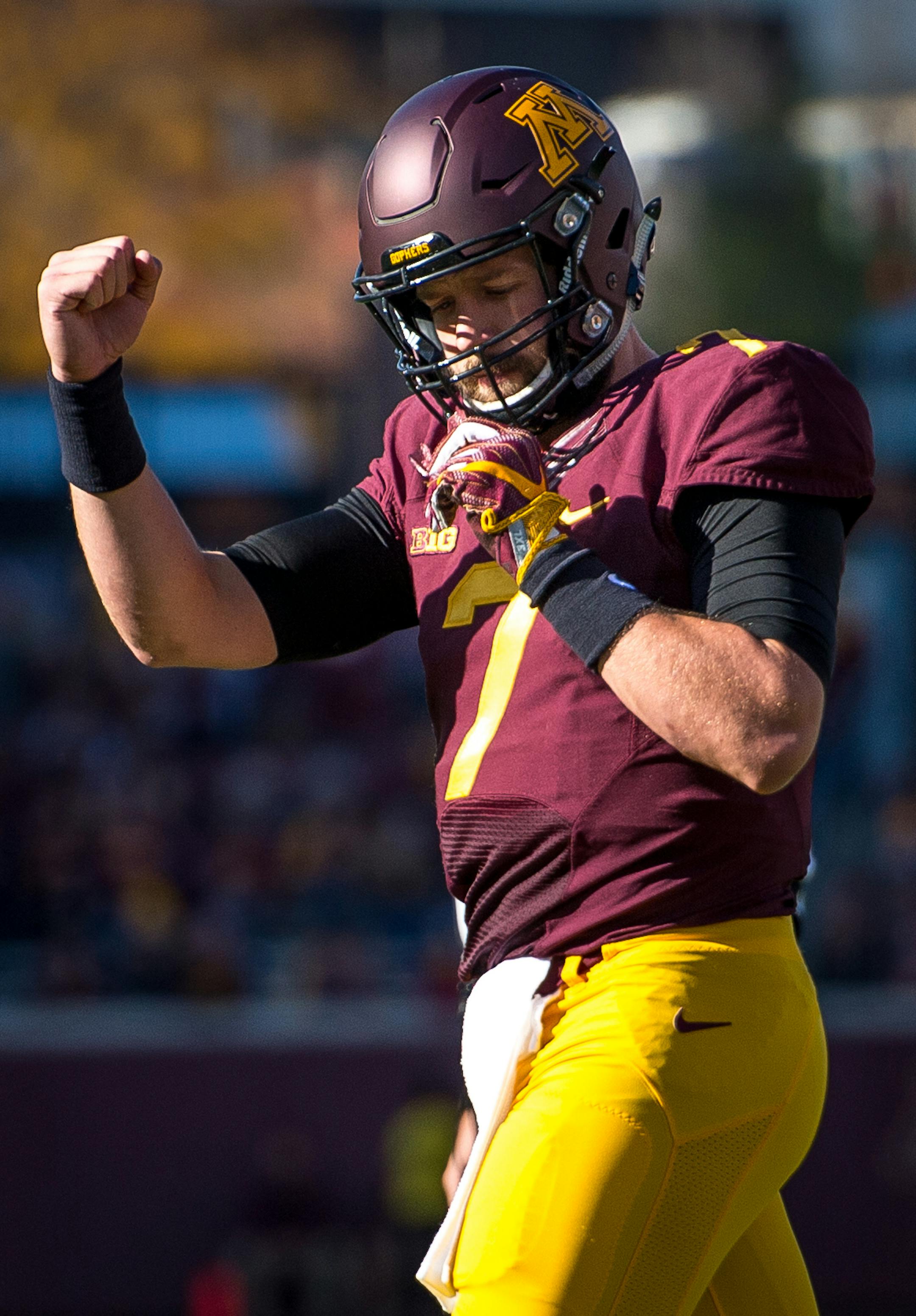 Minnesota Golden Gophers quarterback Mitch Leidner (7) celebrated a one-yard running touchdown by running back Shannon Brooks (23) on the first drive of the first quarter Saturday against Rutgers. ] (AARON LAVINSKY/STAR TRIBUNE) aaron.lavinsky@startribune.com The University of Minnesota Golden Gophers football team played the Rutgers Scarlet Knights on Saturday, Oct. 21, 2016 at TCF Bank Stadium in Minneapolis, Minn.
