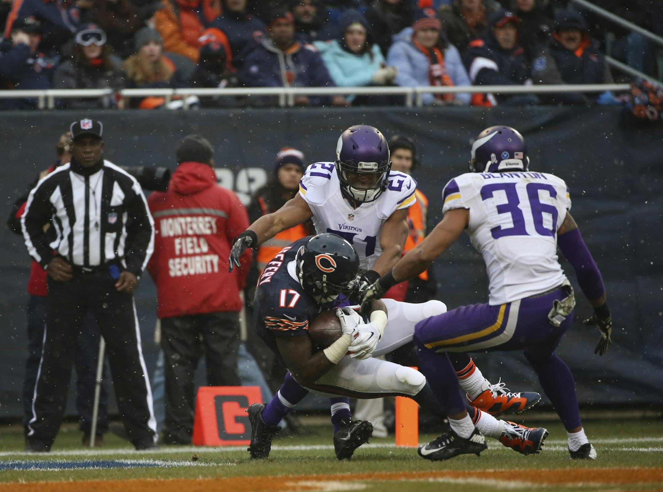 Chicago Bears wide receiver Alshon Jeffery (17) had a 27 yard touchdown reception in between Vikings cornerback Josh Robinson (21) and strong safety Robert Blanton (36) early in the second quarter Sunday afternoon at Soldier Field in Chicago.
