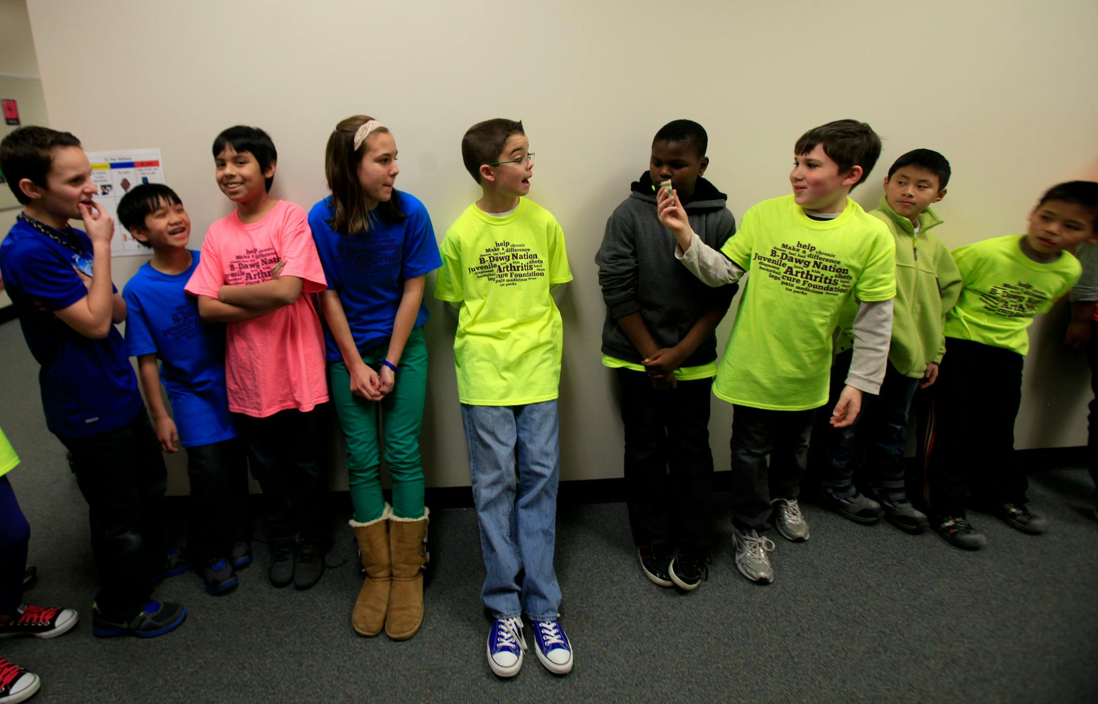 Jarrett Michie, 10, waits in line for lunch with his classmates at Diamond Path School in Apple Valley, MN on January 23, 2013.