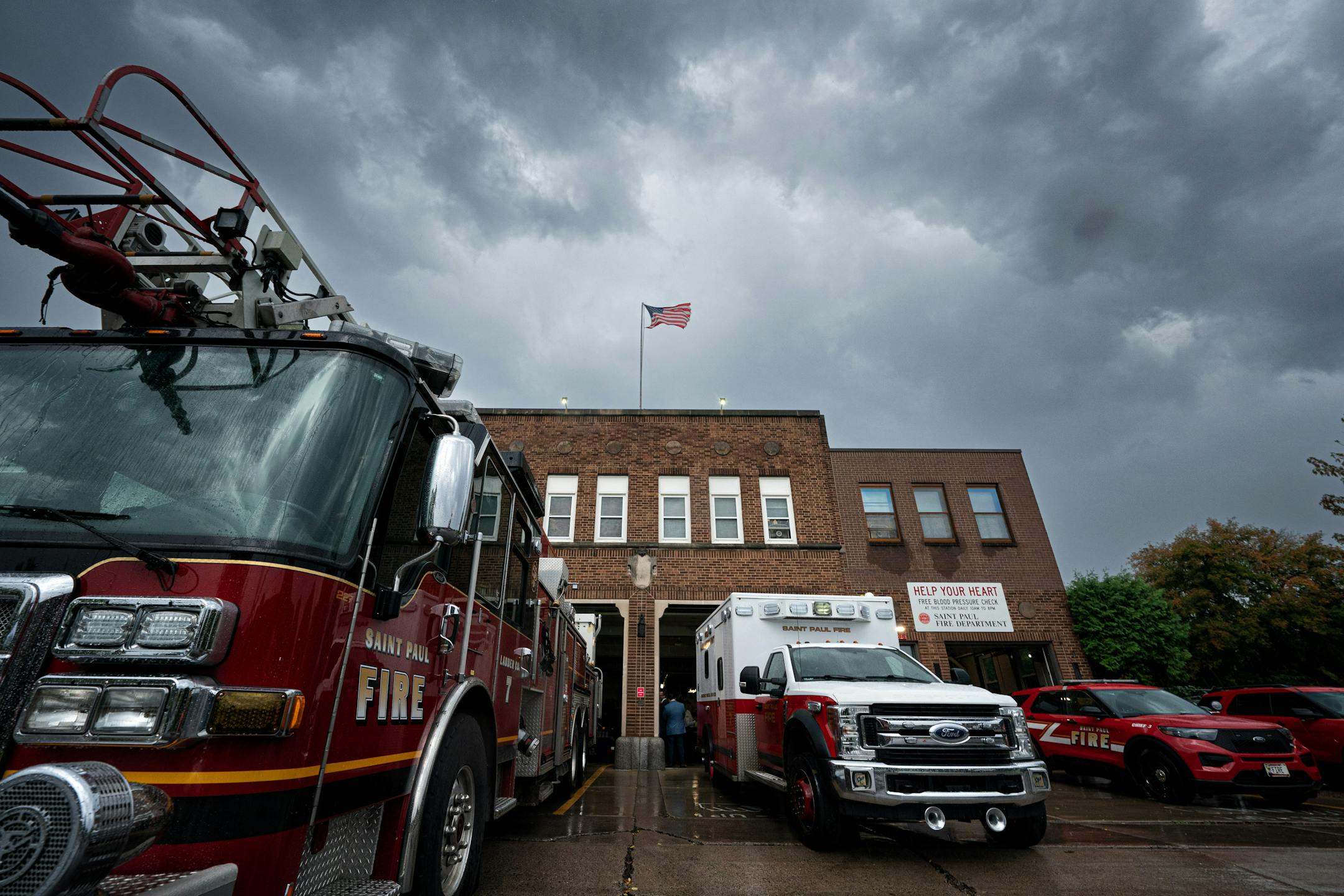 Rain clouds gathered over the existing 92-year-old Fire Station 7 which will be eventually be replaced by a new station Friday, Sept. 29, 2023 St. Paul, Minn. Mayor Carter, Deputy Mayor Tincher, and Fire Chief Butch Inks at the groundbreaking ceremony for new Fire Station 7, on the corner of Ross Avenue and Earl Street on Saint Paul's East Side. This new Fire Station will replace the existing 92-year-old facility, which has become increasingly inadequate for serving the community's emergency response needs.