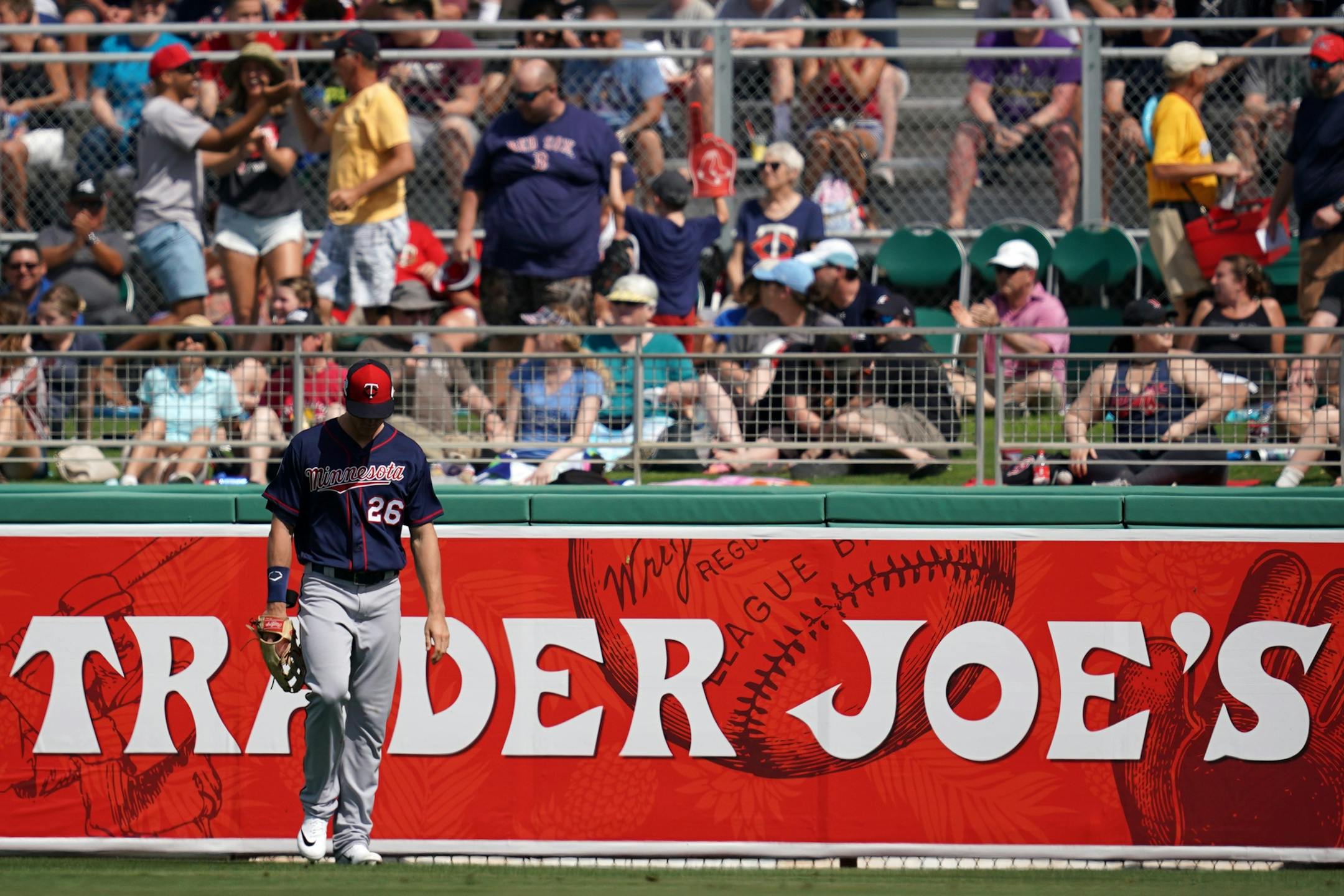 Minnesota Twins right fielder Max Kepler (26) walked back with his head down after he was unable to stop a ball hit by Boston Red Sox center fielder Jackie Bradley Jr. (19) from sailing over the wall for a home run during Sunday's game.