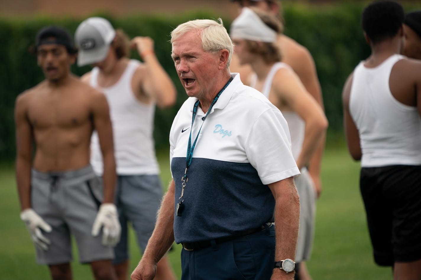 Becker High School long time football coach Dwight Lundeen spoke to the team during practice in Becker, Minn., on Tuesday, August 24, 2021. Lundeen is in his 52nd year of coaching the Becker football team.