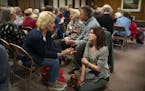 At the urging of Minnesota Methodists' Becky Boland, the audience broke up in to small groups to talk about three questions, including "What is essent