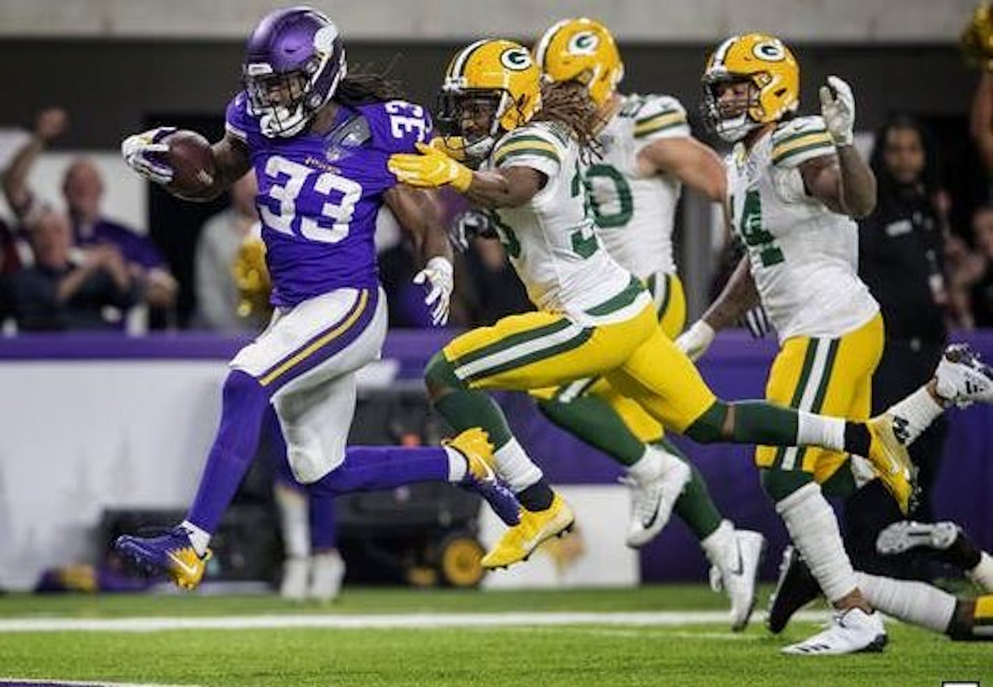 Dalvin Cook raced through Packers players for the Vikings' first touchdown, a 26-yard catch and run, on Sunday night.