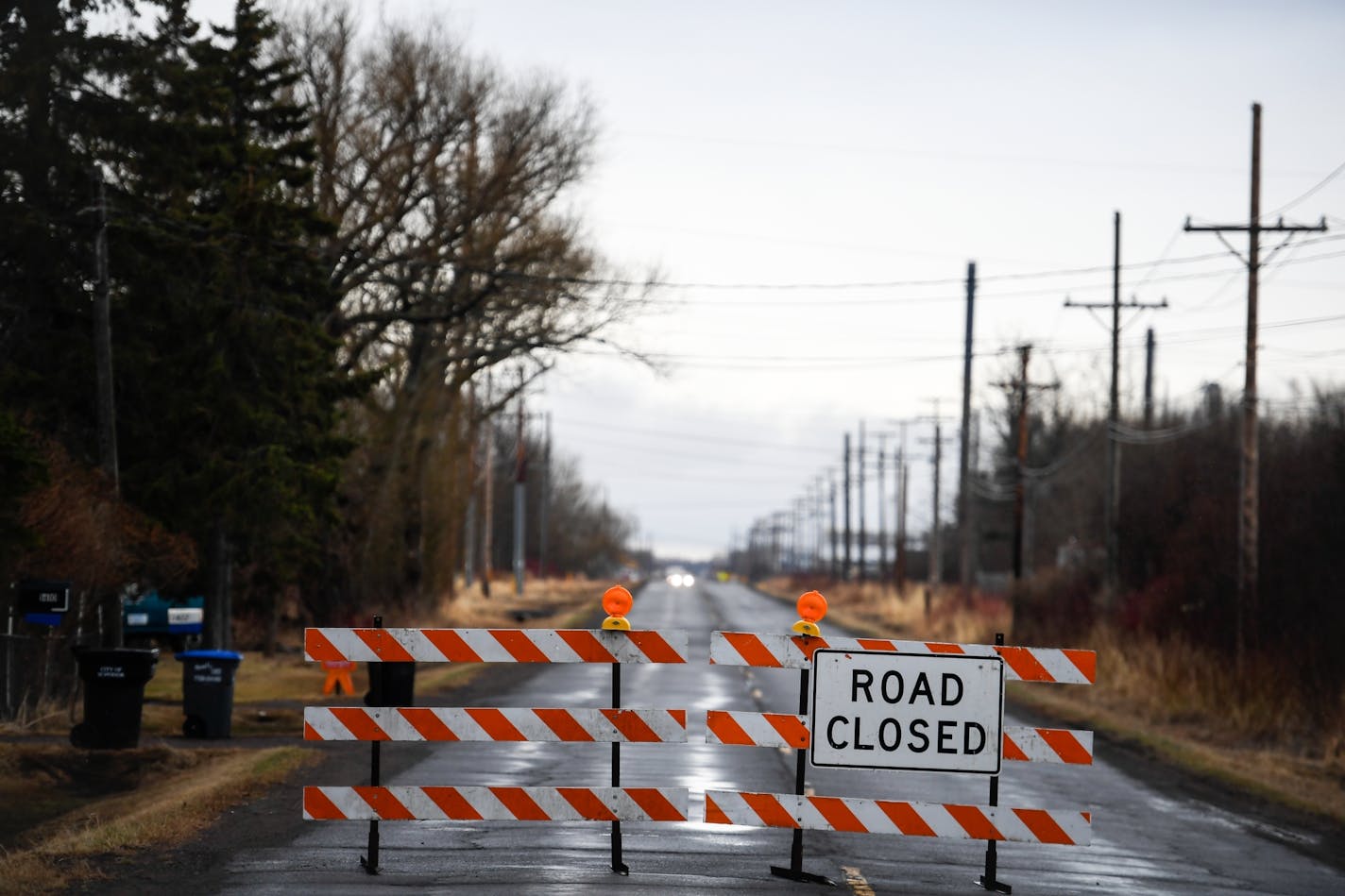 Roads near the Husky Energy oil refinery in Superior, Wisc. remained blocked off to traffic despite the lifting of an evacuation order in the area early Friday morning a day after a series of fires and explosions rocked the refinery and sent a black plume of acrid smoke over the region.