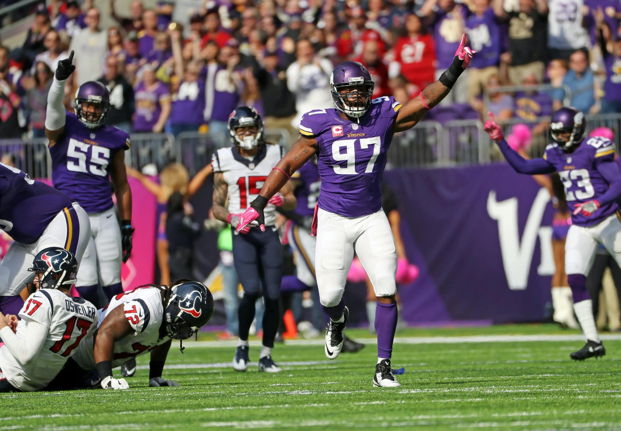 Vikings Everson Griffen celebrates a sack in the 2nd quarter, but was called off sides and was penalized on the play.