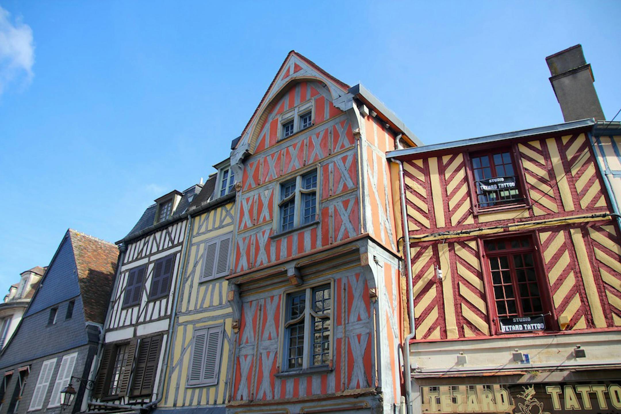 The Medieval timber buildings in Auxerre. ] Photo by Alexander Besant, Hearst Newspapers