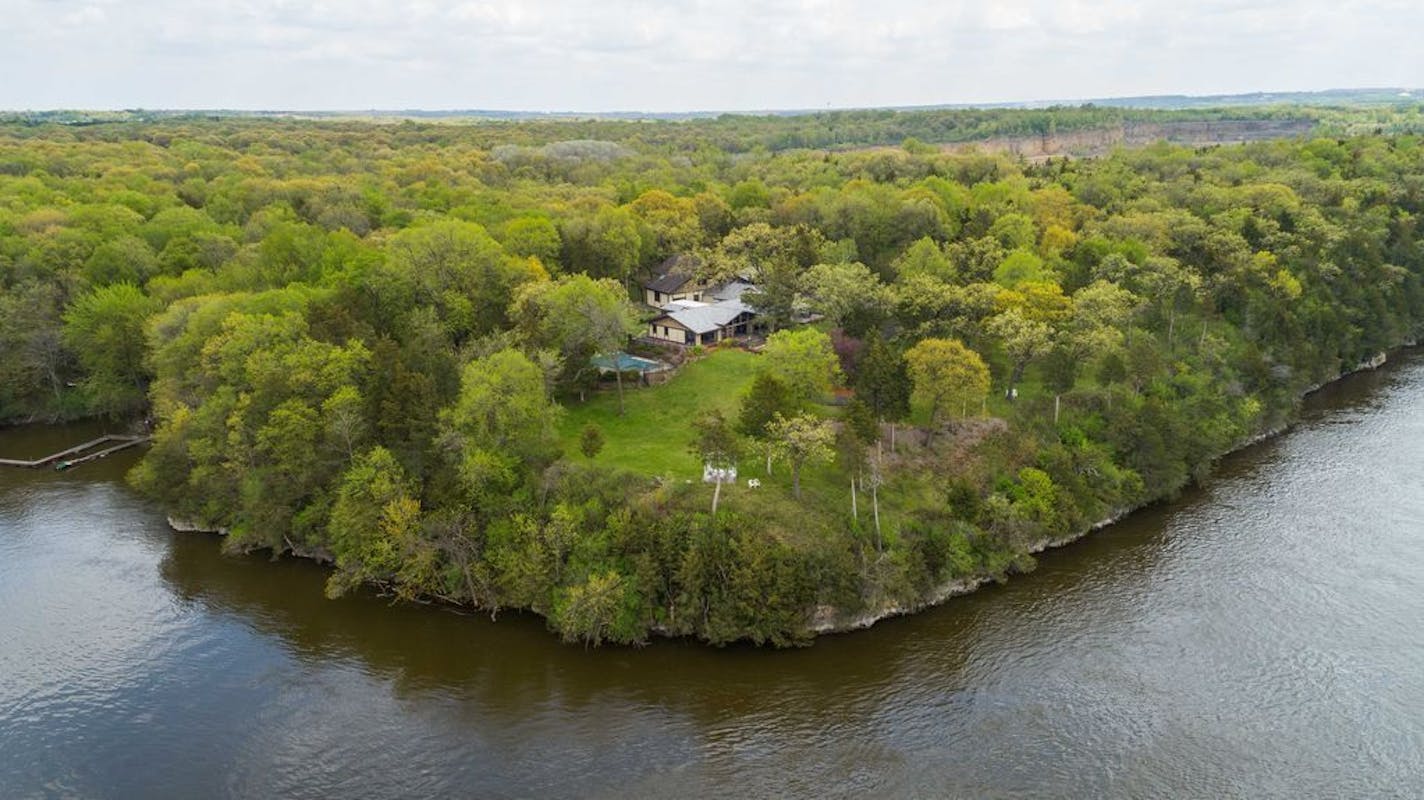 $1.595 million Mississippi River home on Grey Cloud Island by the city of St. Paul Park.