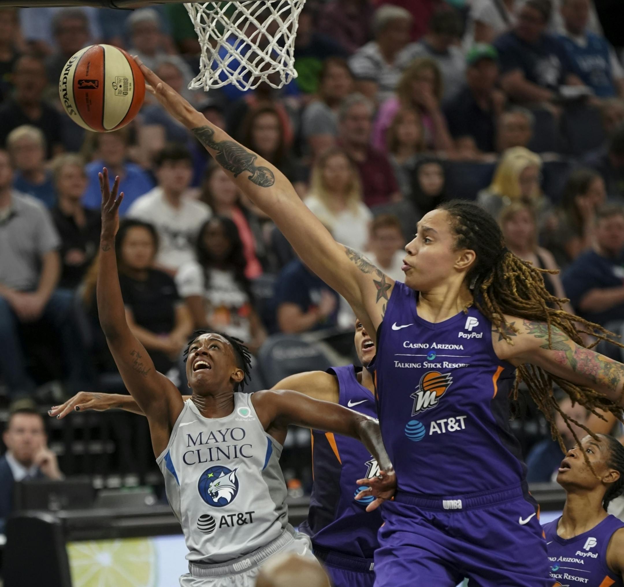 Minnesota Lynx guard Danielle Robinson had her second quarter shot slapped away by Phoenix Mercury center Brittney Griner.