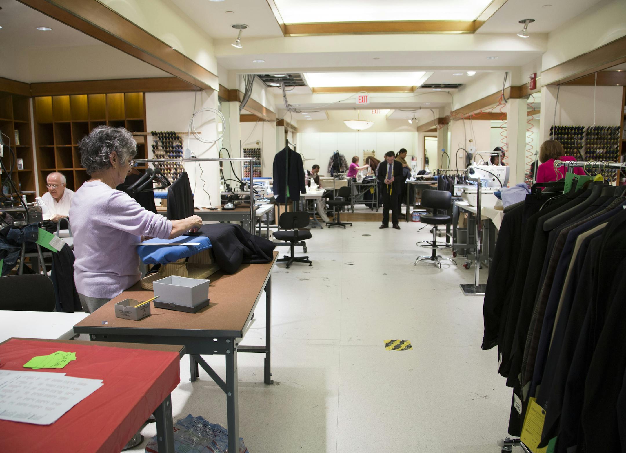 Tailors work on the 4th floor of Boyds department store on Jan. 22, 2016 in Philadelphia, Pa. Boyds emphasizes custom tailoring despite the popularity of cheap, ready to wear fashion. (Jennifer Kerrigan/Philadelphia Inquirer/TNS) ORG XMIT: 1180132