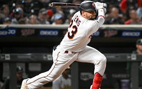 Minnesota Twins shortstop Royce Lewis (23) singles for his first career hit in the bottom of the 8th inning.