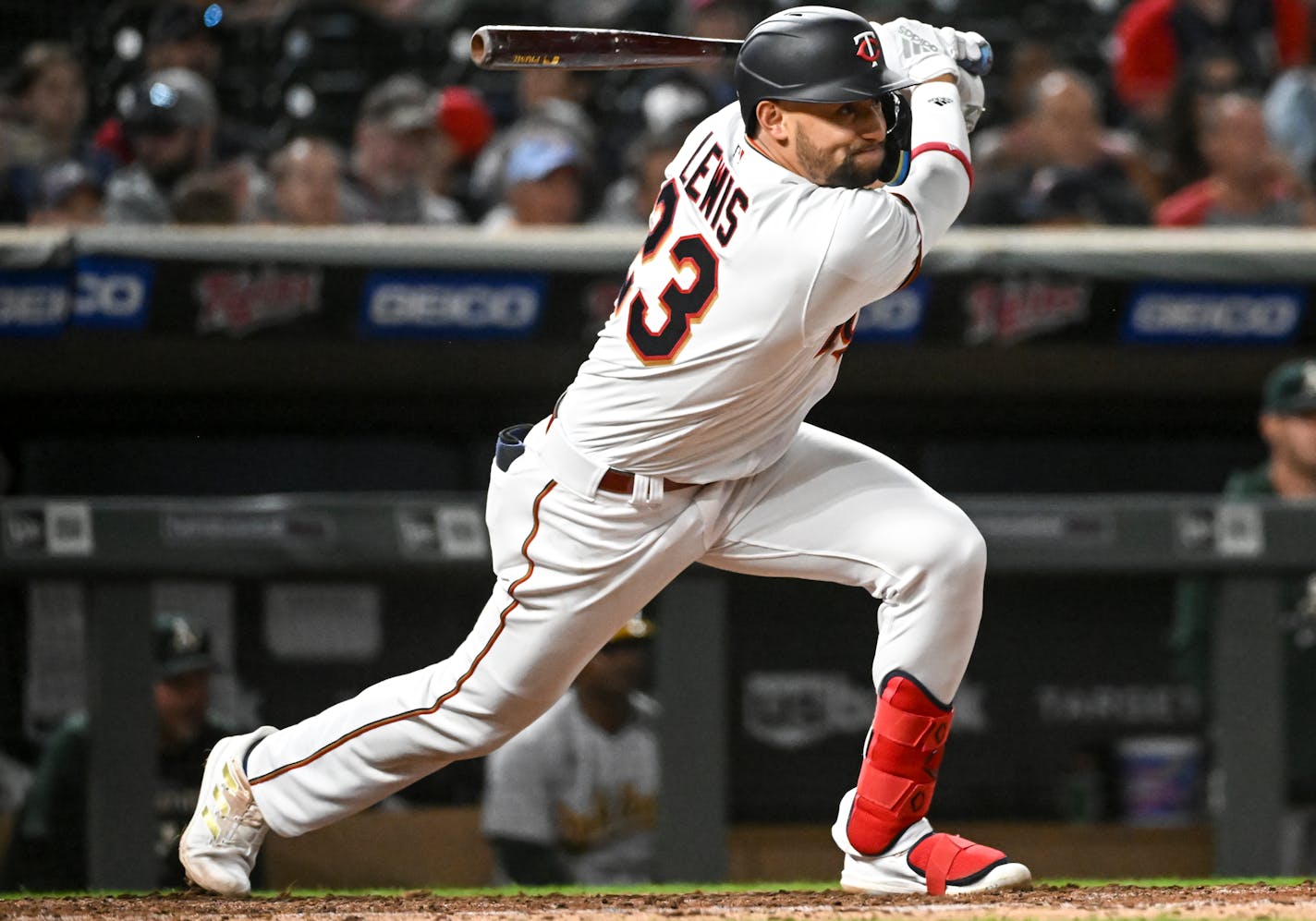 Minnesota Twins shortstop Royce Lewis (23) singles for his first career hit in the bottom of the 8th inning.