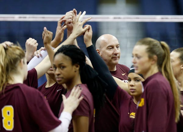 Gophers coach Hugh McCutcheon gathered his team during practice Wednesday in Columbus, Ohio, in preparation for Thursday's NCAA semifinal against Stan