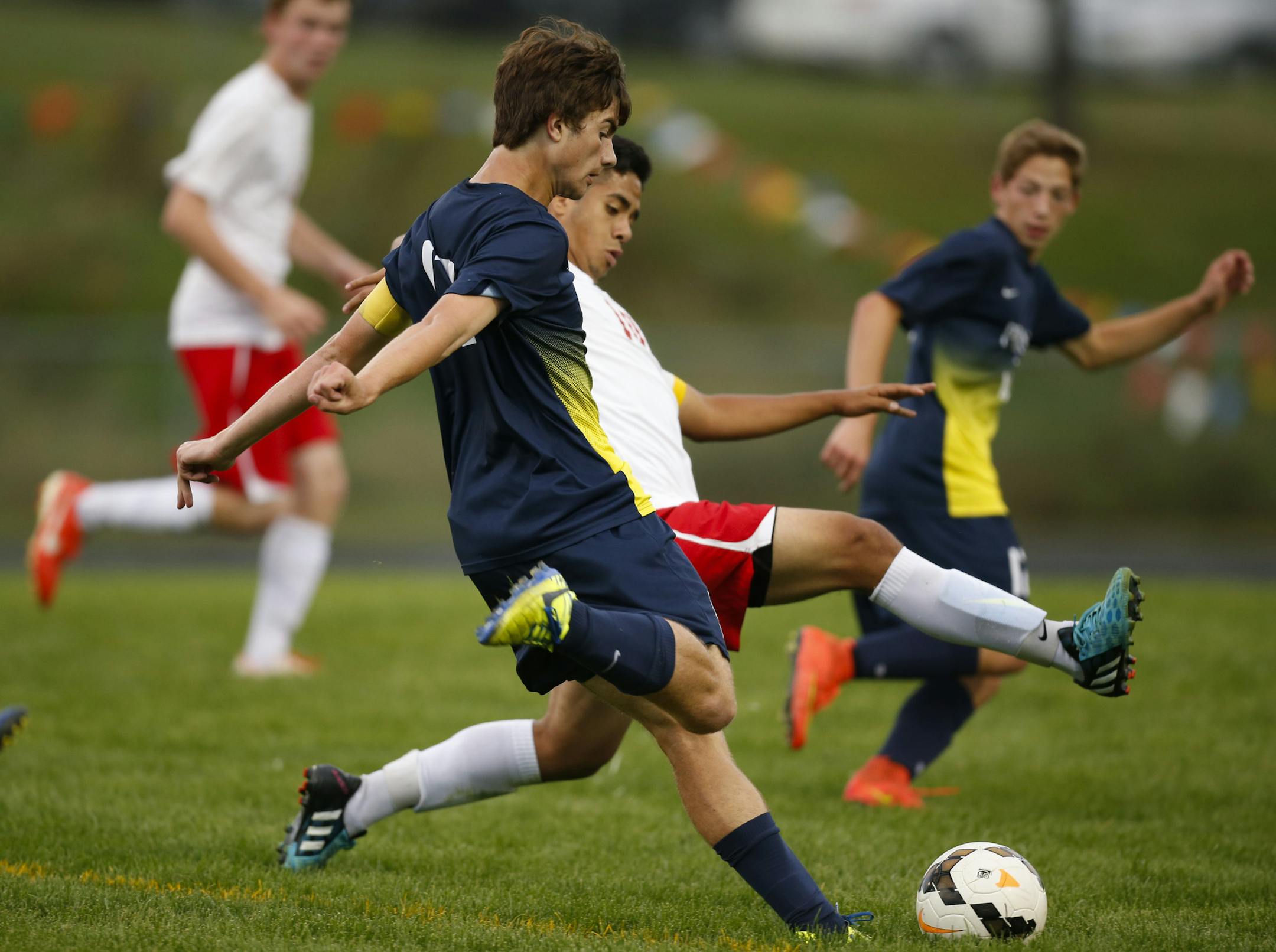 Prior Lake's Austin Gaffney tried to get a second half shot off while defended by Shakopee's Jacob Arellano Tuesday evening at West Junior High School in Shakopee. ] JEFF WHEELER ‚Ä¢ jeff.wheeler@startribune.com The Prior Lake boy's soccer team lost 1-0 to Shakopee Tuesday evening, September 23, 2014 at West Junior High School in Shakopee.