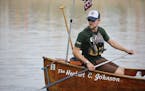 Christopher Dunham, a guide with Wilderness Inquiry, led the group of 16 Augsburg College students aboard The Herbert C. Johnson canoe at Kelly's Land
