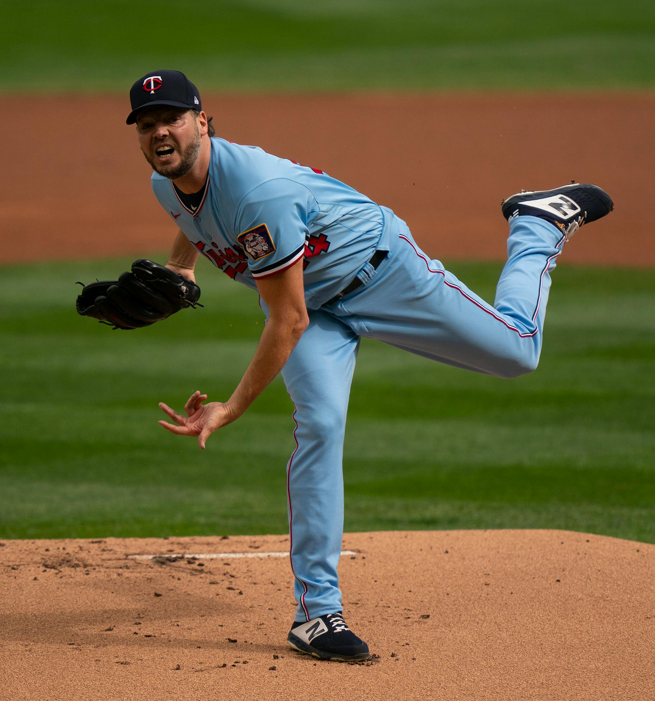 Minnesota Twins starting pitcher Rich Hill (44) following through while throwing against Cincinnati in the first inning.