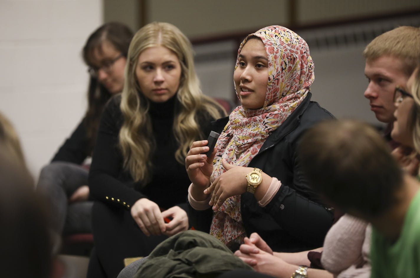 Ayah Abuserrieh, one of a small group of UMD students who attended the speech, asked a question of Charlie Kirk about access to education during the Q & A following his speech. ] JEFF WHEELER &#x2022; jeff.wheeler@startribune.com Charlie Kirk, brought his "Smashing Socialism" tour to the U of M for a speaking engagement without incident Tuesday night, December 5, 2017. Campus conservatives say they're fighting attempts to silence them, and facing backlash - and even physical threats - in the pro