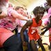 Agwa Nywesh celebrated in the student section after making a last-second basket to win Monday night's game against Mayo. He scored 30 points while wea