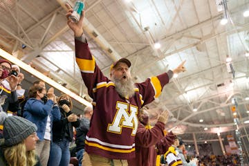 Gophers fan Kristian Tharaldson celebrated after a goal against Minnesota Duluth earlier this season.