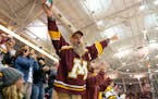 Gophers fan Kristian Tharaldson celebrated after a goal against Minnesota Duluth earlier this season.