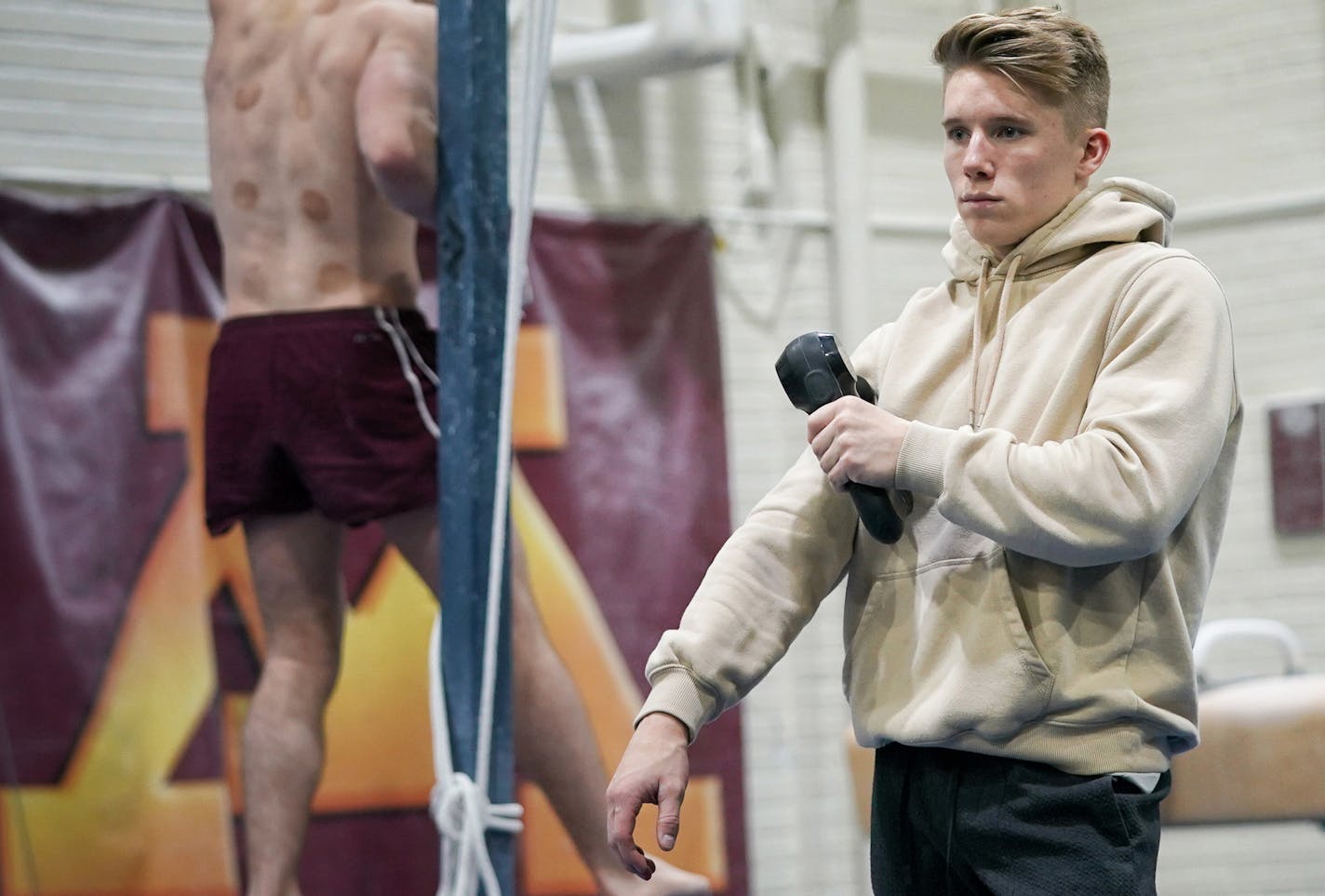 The elimination of the Gophers' program means All-America gymnast Shane Wiskus will resume his Olympic preparations in Colorado.