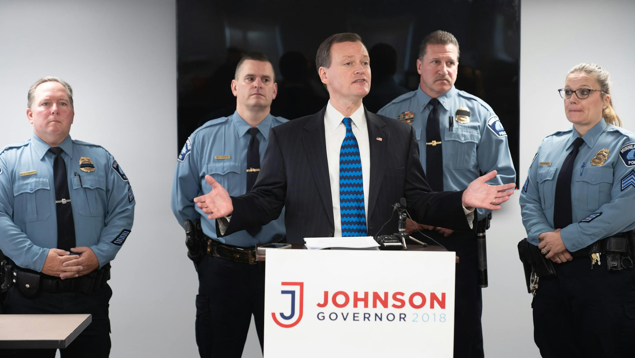 The Minneapolis Police union endorsed Jeff Johnson for governor at a news conference with Johnson and union president Bob Kroll. Behind Jeff Johnson are Steve Fogarty, director; Mark Johnson, director; Bob Kroll, president and Sheryl Schmidt, vice president.