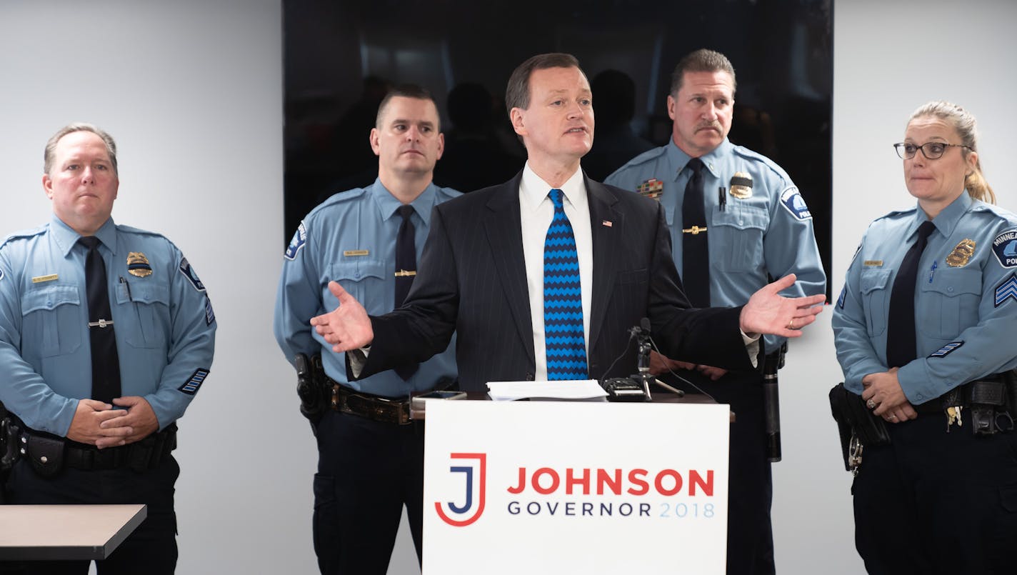 The Minneapolis Police union endorsed Jeff Johnson for governor at a news conference with Johnson and union president Bob Kroll. Behind Jeff Johnson are Steve Fogarty, director; Mark Johnson, director; Bob Kroll, president and Sheryl Schmidt, vice president.