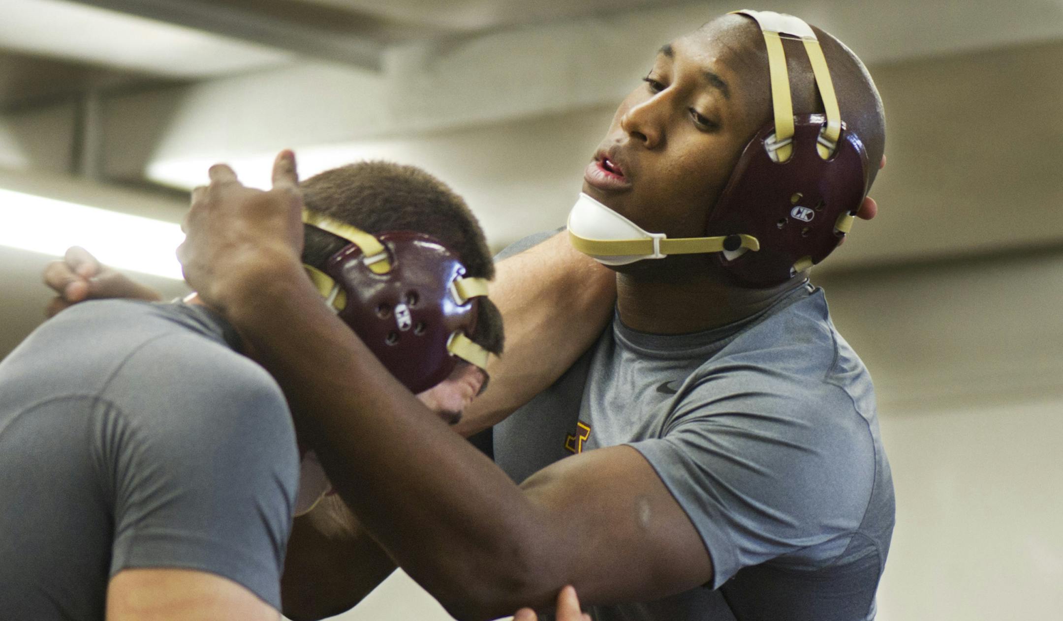 Joel Bauman (top) won't use an alias for his music videos to preserve his eligibility. "It's not Little Joel or M.C. Joel. It's me," he said.