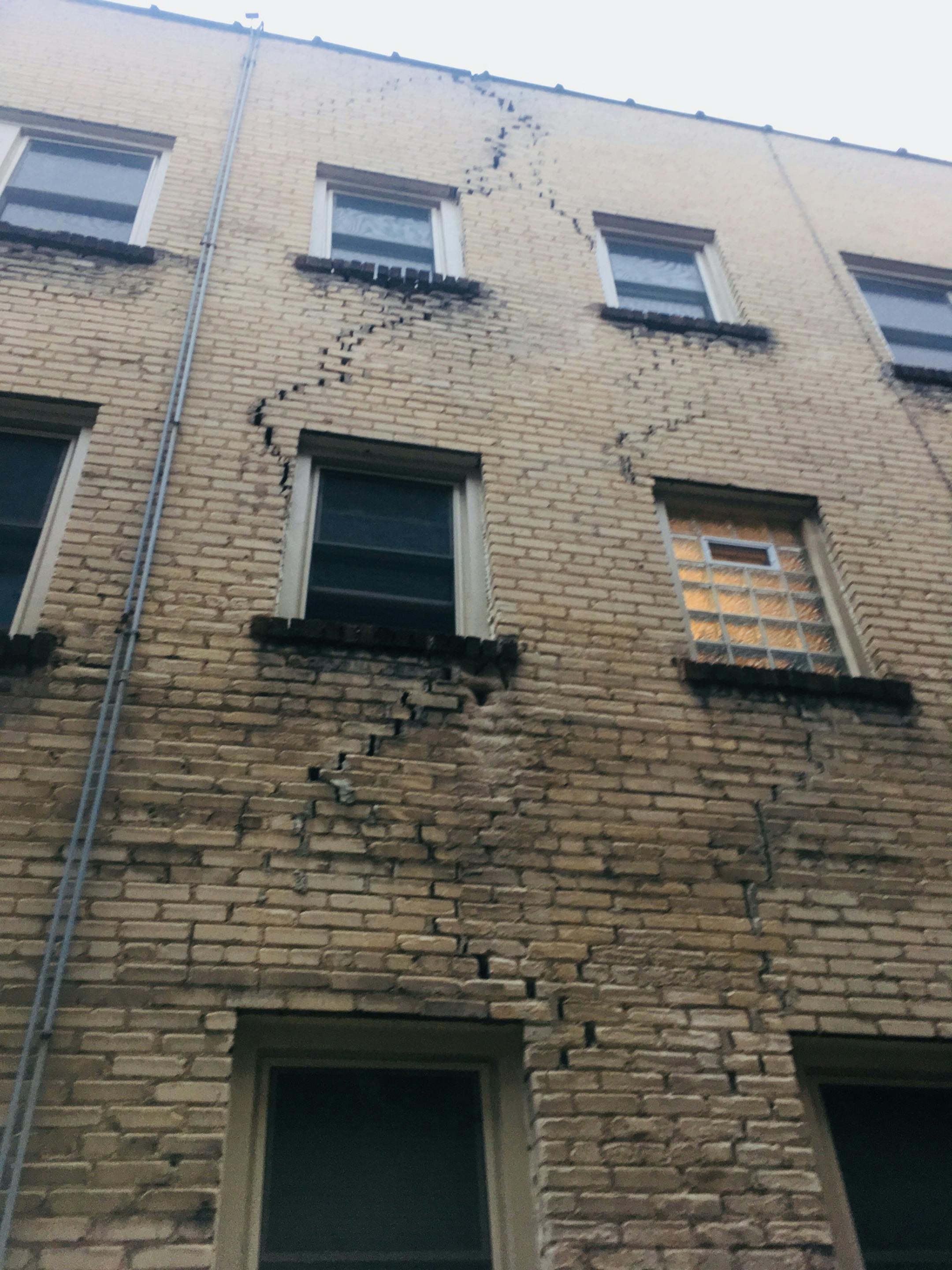 This 27-unit rental building in south Minneapolis began developing large cracks to its exterior early summer, when construction crews began work on an adjacent lot.