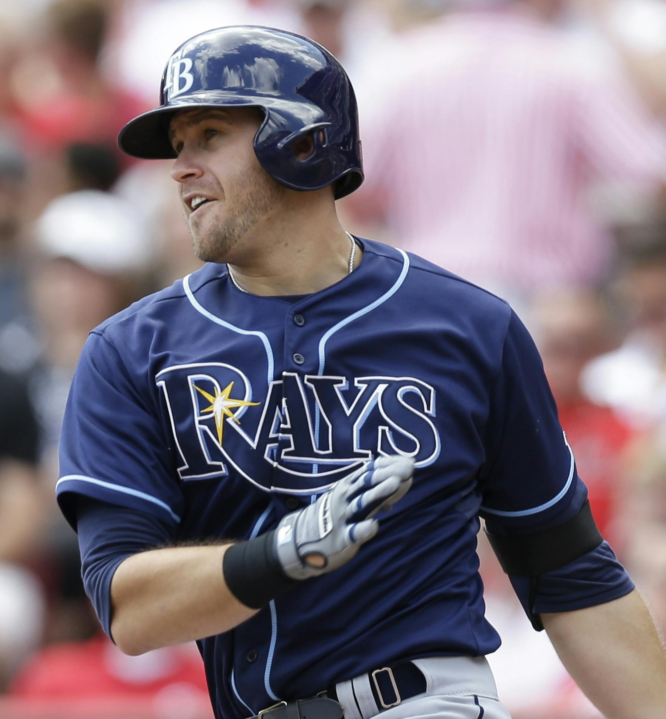 Tampa Bay Rays' Evan Longoria gets a hit off Cincinnati Reds starting pitcher Alfredo Simon in the sixth inning of a baseball game, Saturday, April 12, 2014, in Cincinnati. Brayan Pena catches at right. (AP Photo/Al Behrman) ORG XMIT: CSA101